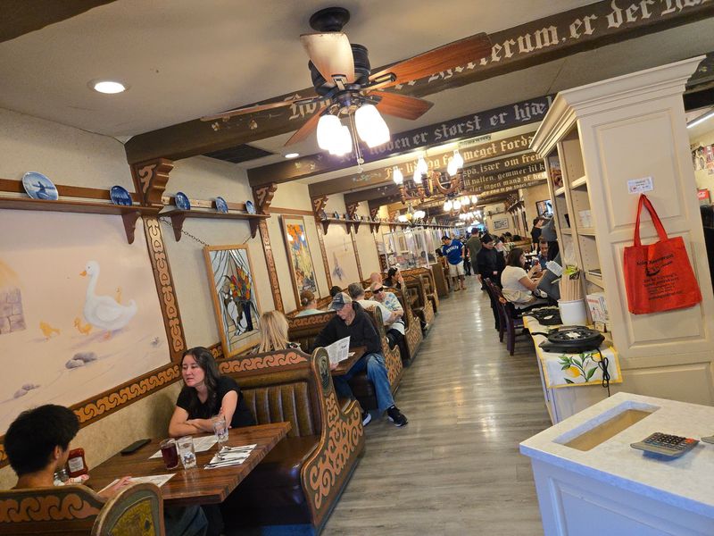 Carved Beams and Tiny Painted Houses Carved Beams and Tiny Painted Houses