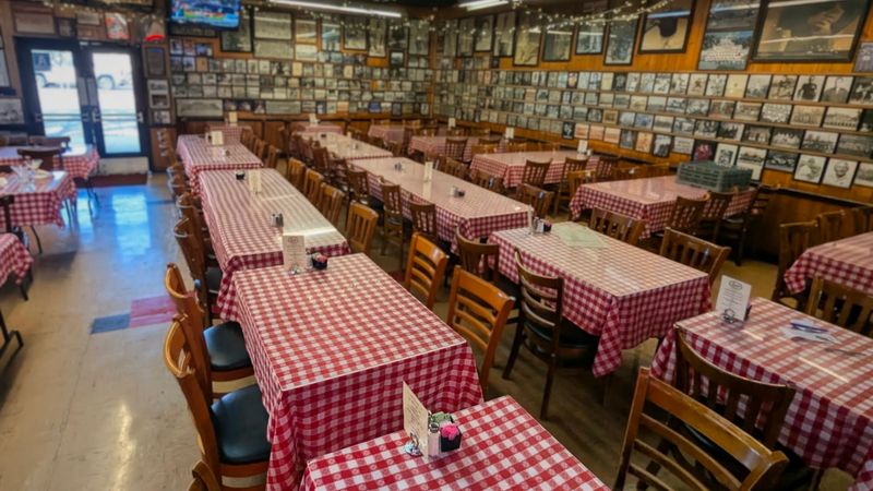 Checkered Tables and Photo-Covered Walls