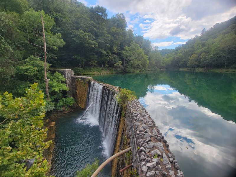 Mirror Lake And Its Tumbling Waterfall