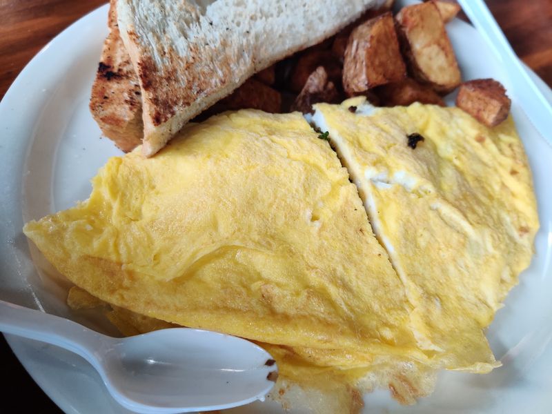 Omelets And Big Breakfast Plates