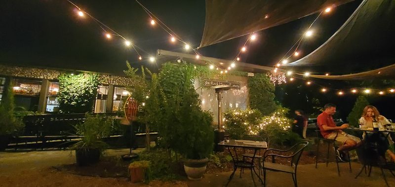 Patio Seating And A Greenhouse Surprise Patio Seating And A Greenhouse Surprise
