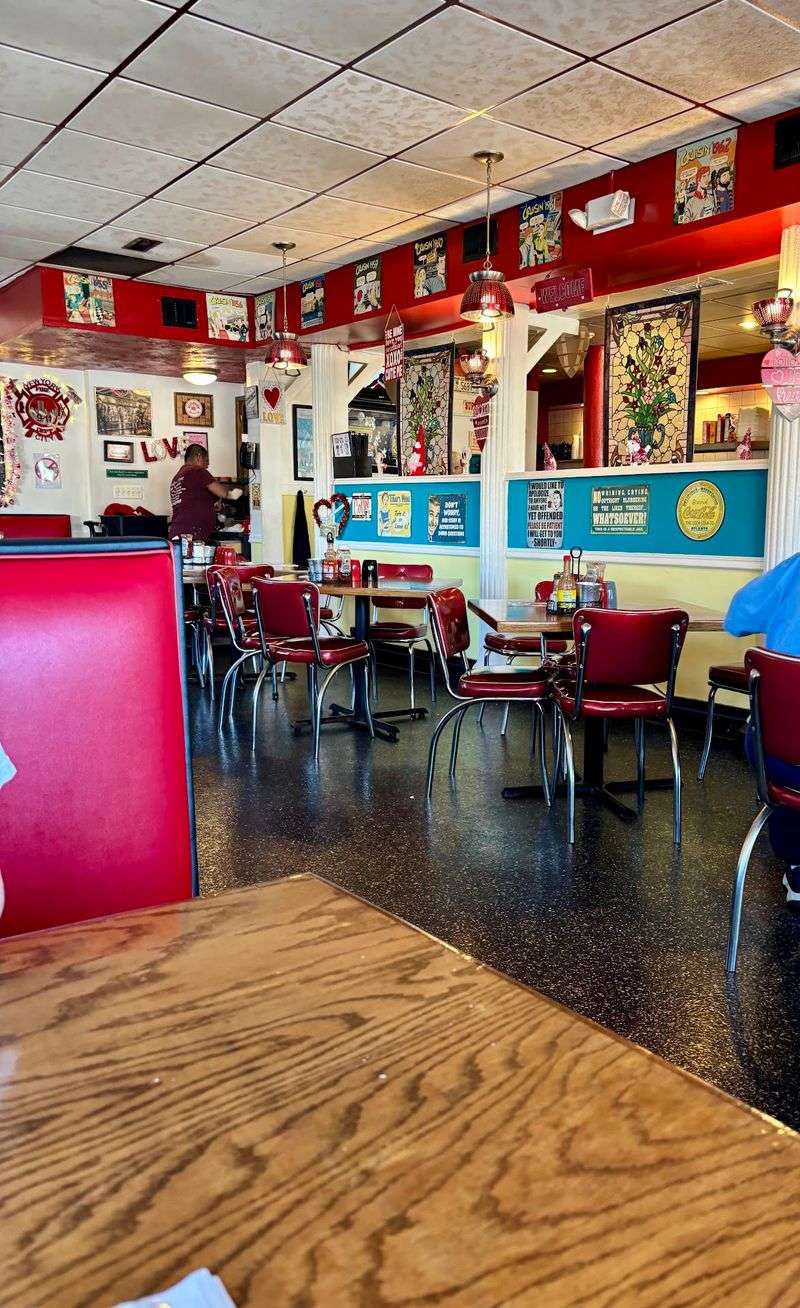 Red Booths And Walls That Tell Stories Red Booths And Walls That Tell Stories