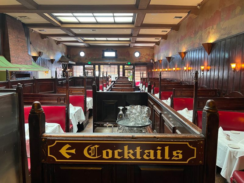 Red Booths and Wood-Paneled Charm