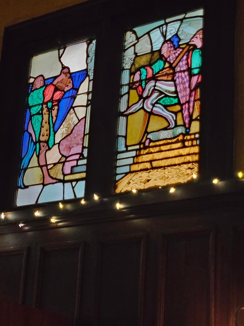 Stained Glass, Brass, And Wooden Booths