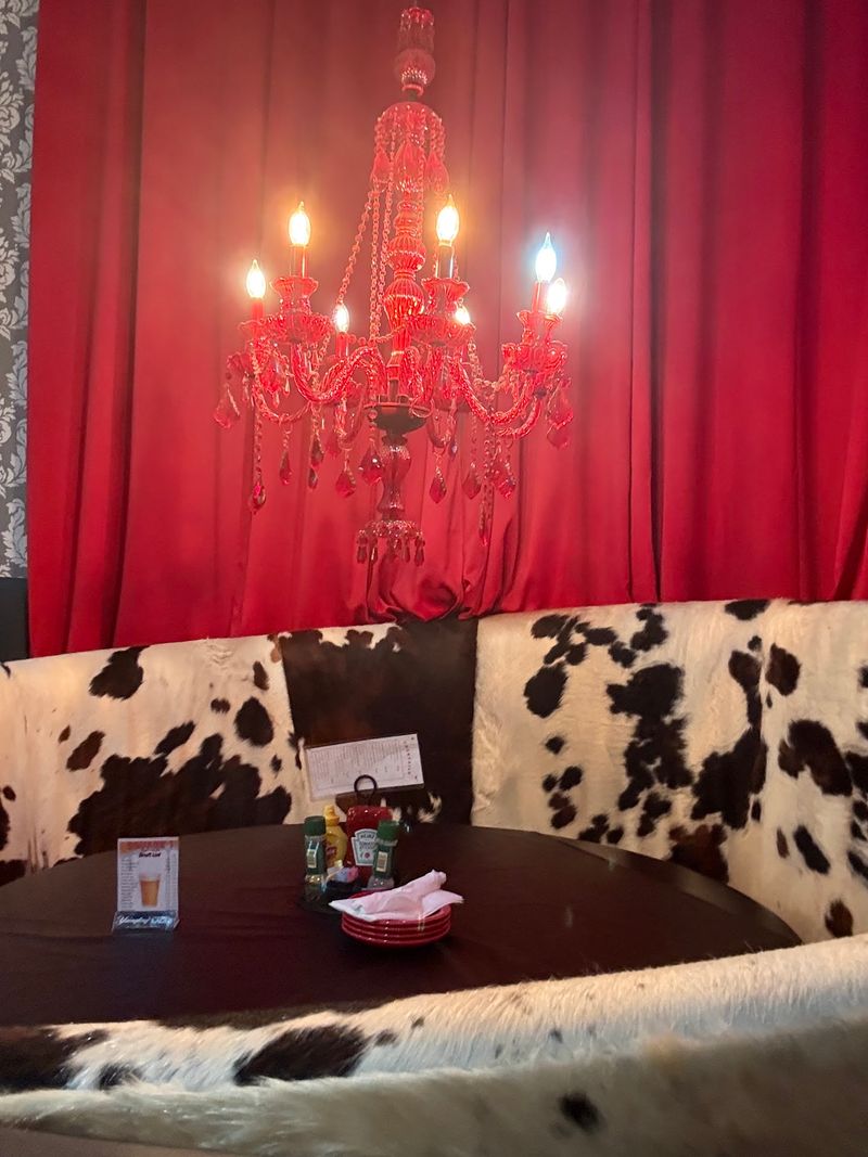 The Cow Theme And Chandeliers