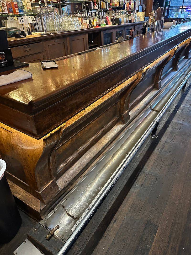 The Famous Running-Water Bar And Spittoon Trough