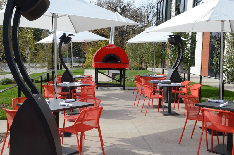 The Landscaped Patio With Its Own Outdoor Oven