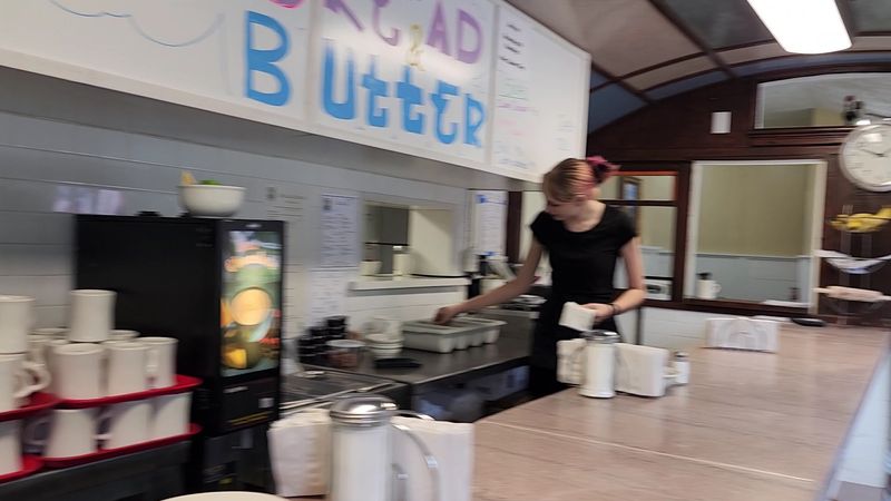 The Welcoming Crew Behind The Counter