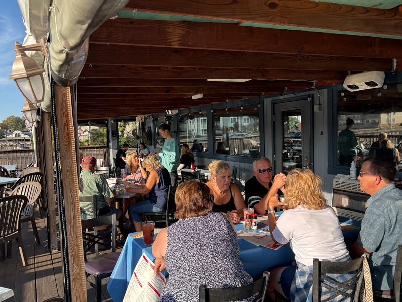 Two Decks And Seating That Wraps The Bar