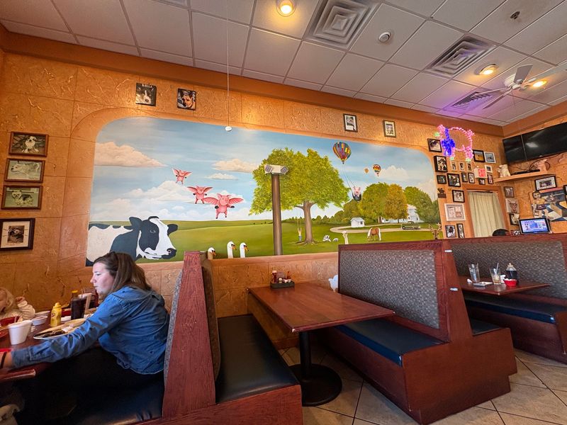Walls Lined With Animal Art And Photos