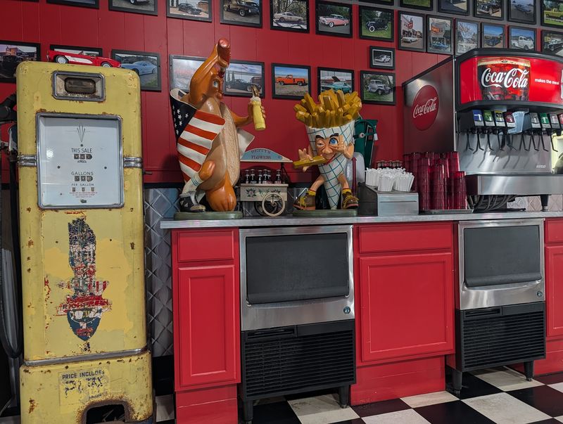 Walls Packed With Vintage Cars And Antiques