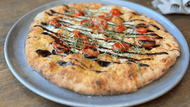 Wood-Fired Pizzas And A Menu Full Of Surprises
