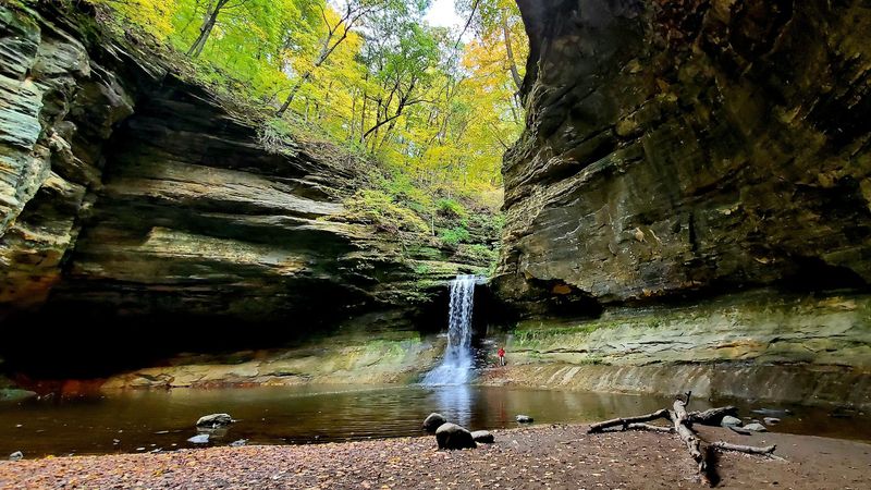This Illinois Waterfall Spills Into a Shaded Sandstone Canyon at the End of a Rugged, Stair-Stepped Trail