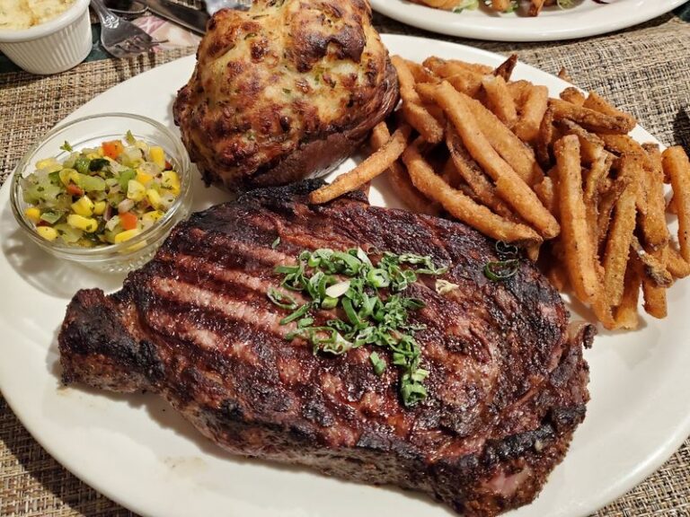 This Cozy Connecticut Steakhouse Has Been Grilling Charcoal Steaks In A Roadside Log Cabin Since The 1930s