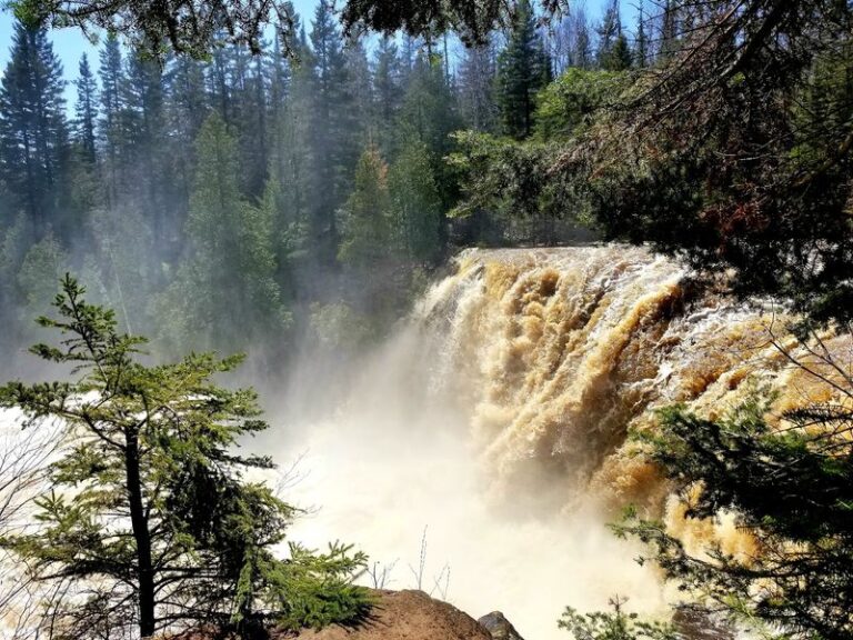 This Minnesota Waterfall Tumbles Over Rocky North Shore Ledges Just a Short Walk From the Highway