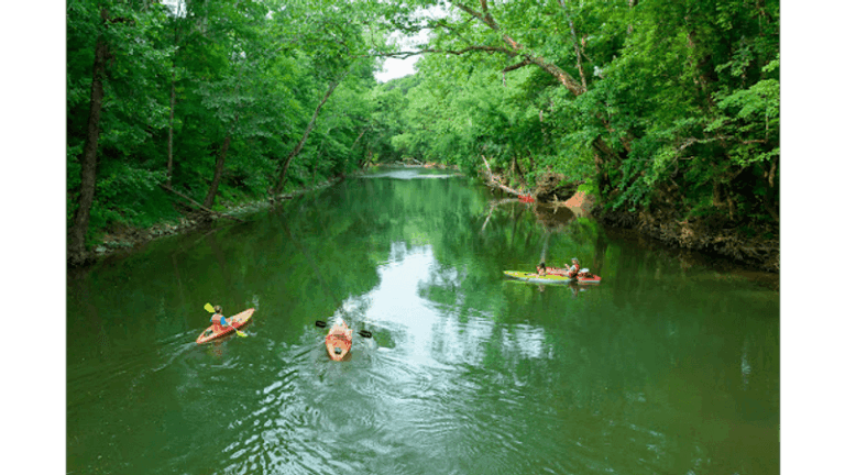 You Can Paddle A Quiet Blue River Past Limestone Bluffs On This Southern Indiana Float Trip
