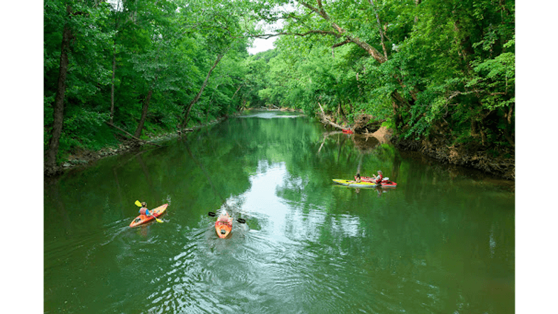 You Can Paddle A Quiet Blue River Past Limestone Bluffs On This Southern Indiana Float Trip