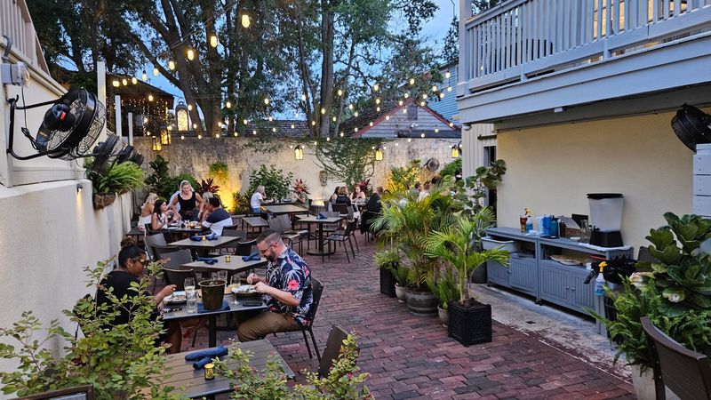 Seafood Stacked On Wooden Picnic Tables Draws Crowds To This Old Florida Fish Market In St. Augustine
