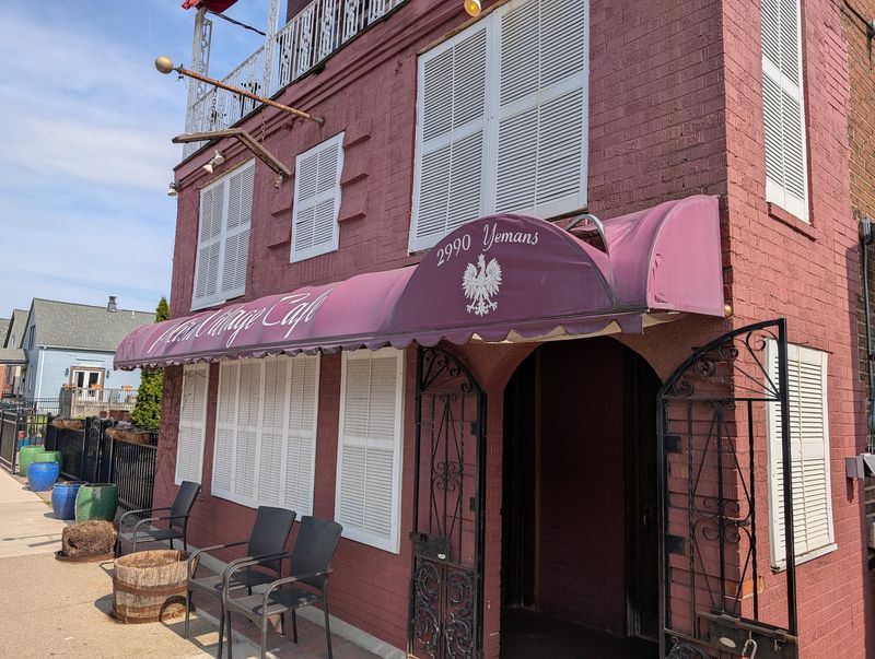 A Cafe Below an Old Hotel