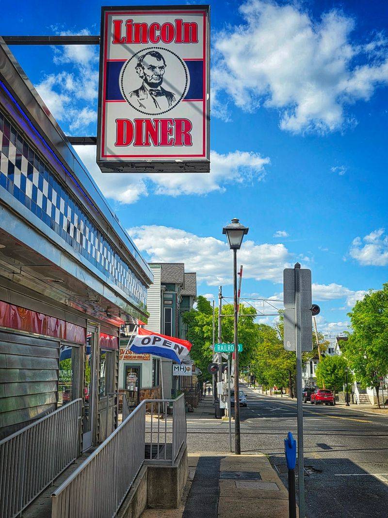 A Diner Car Beside the Tracks