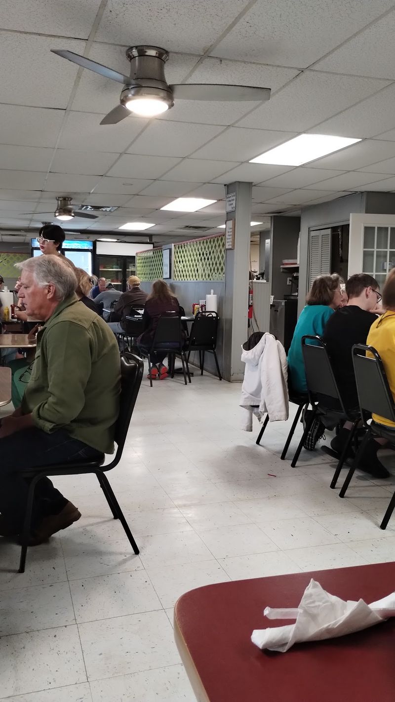 A Full Dining Room With Room to Settle In A Full Dining Room With Room to Settle In
