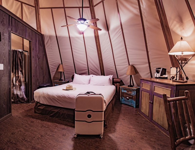 Beds Under Canvas, Cabin Roofs, and Teepee Poles Beds Under Canvas, Cabin Roofs, and Teepee Poles