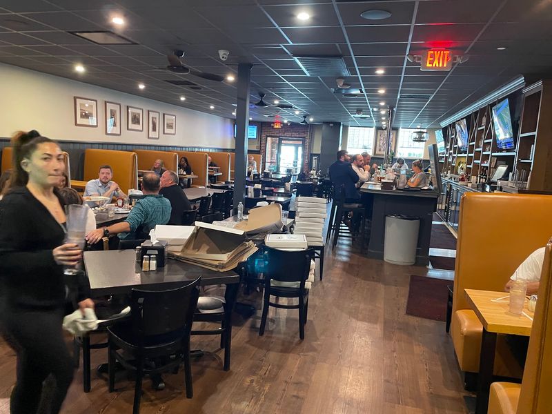 Booths, Bar Stools and Game Day Crowds