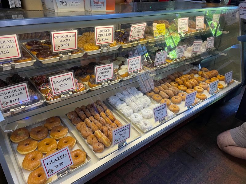 Cases Packed With Glazed, Cake, And Crullers
