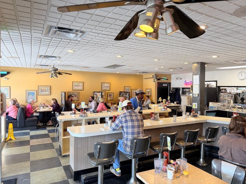 Counter Seats, Busy Booths, and Merch