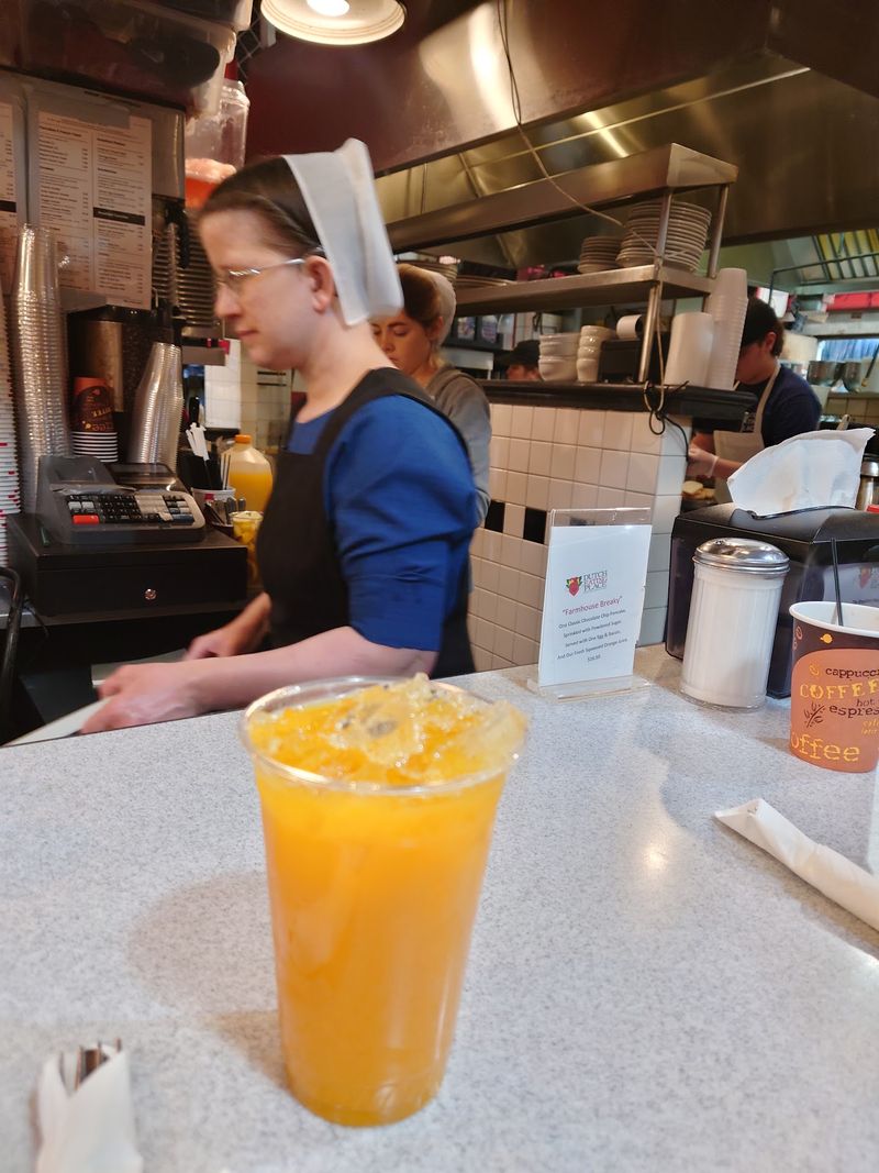 Friendly Faces Behind a Busy Grill Friendly Faces Behind a Busy Grill