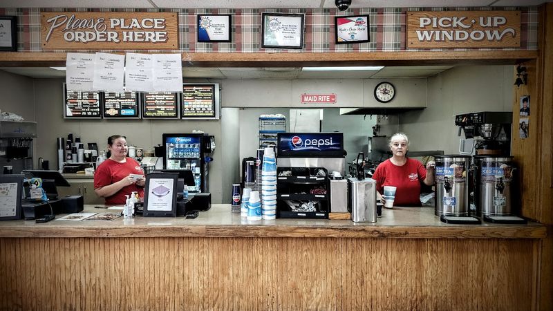 Friendly Faces at the Counter Friendly Faces at the Counter