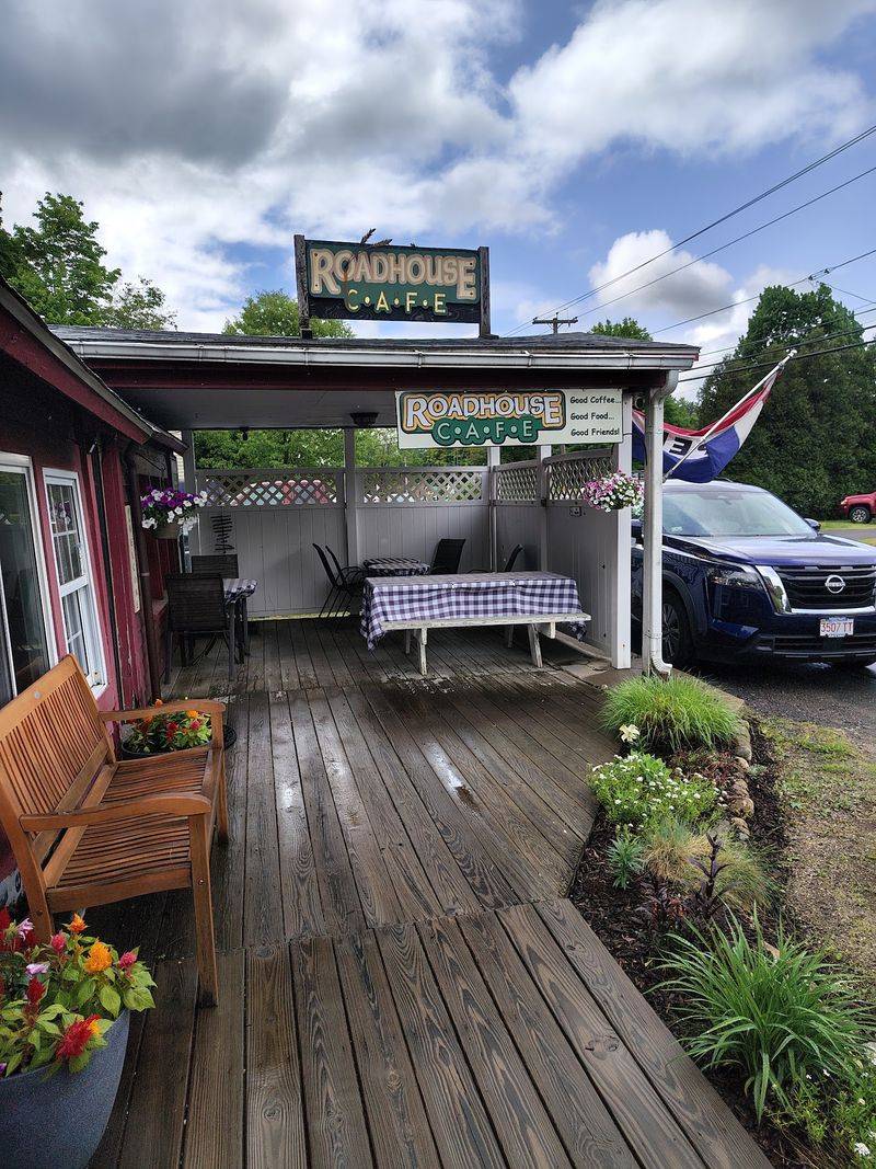 Homey Rooms and Picnic Tables Outside