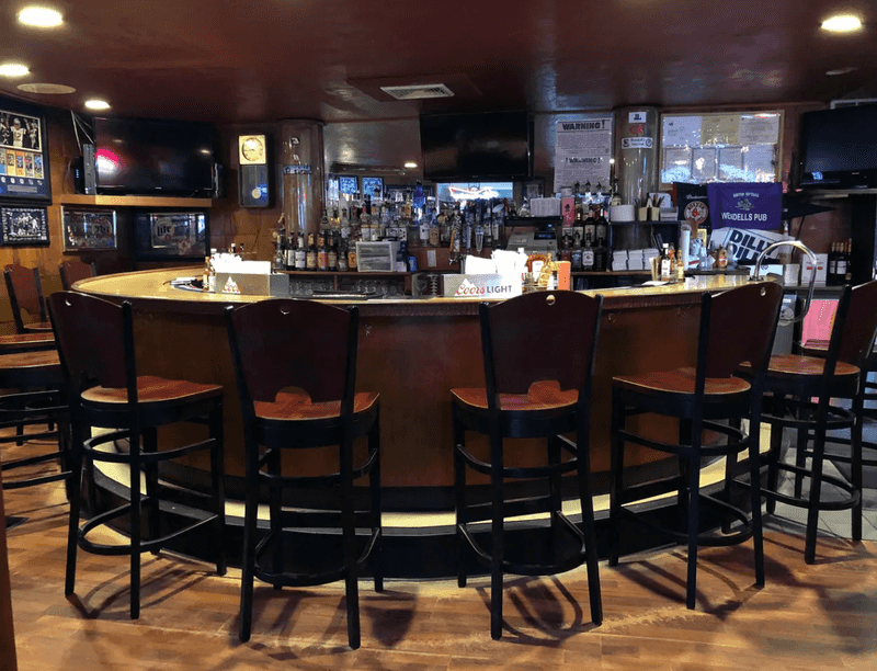 Jukebox, Darts, and a Horseshoe Bar
