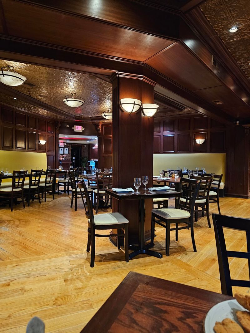 Low Lights and Wood-Lined Walls