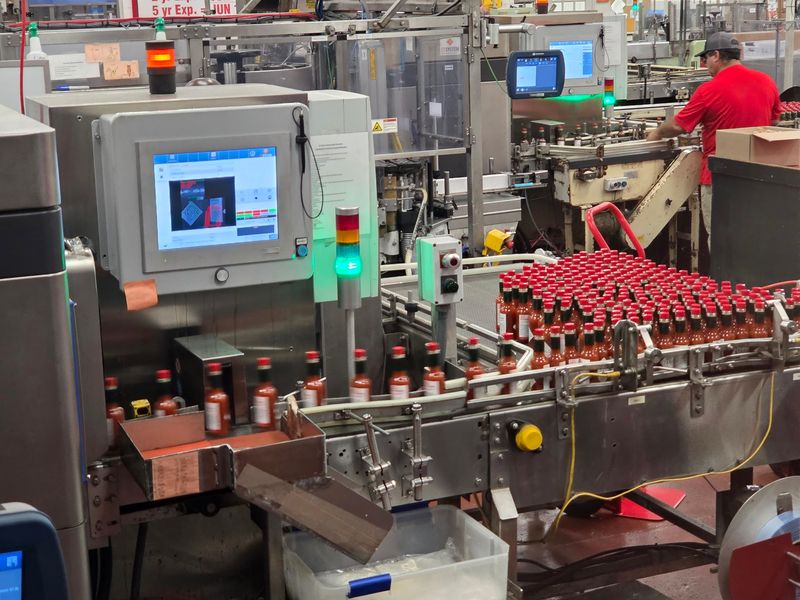 Mashing, Aging, And A Bottling Line In Motion