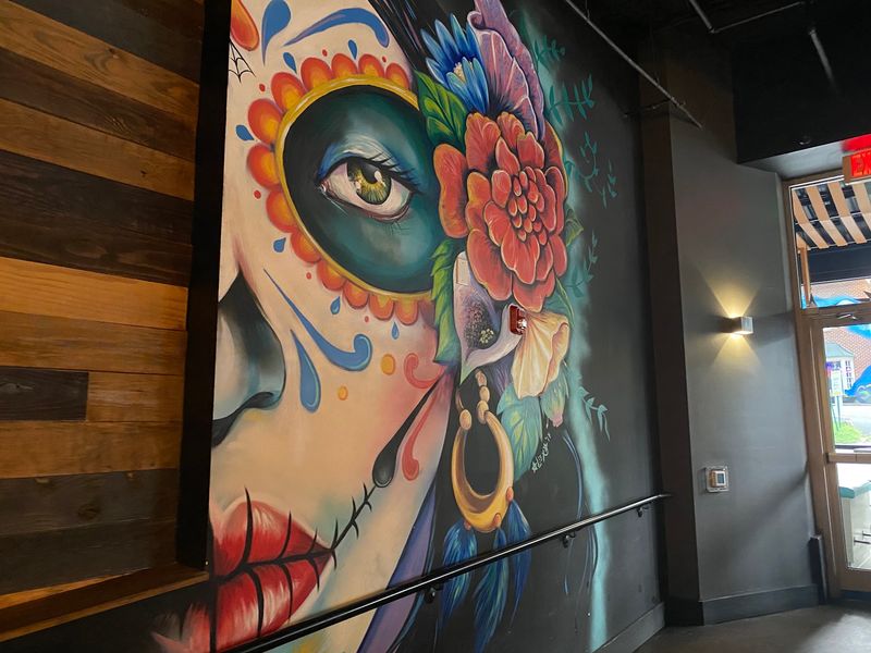 Murals on One Side, Gray Minimalism on the Other