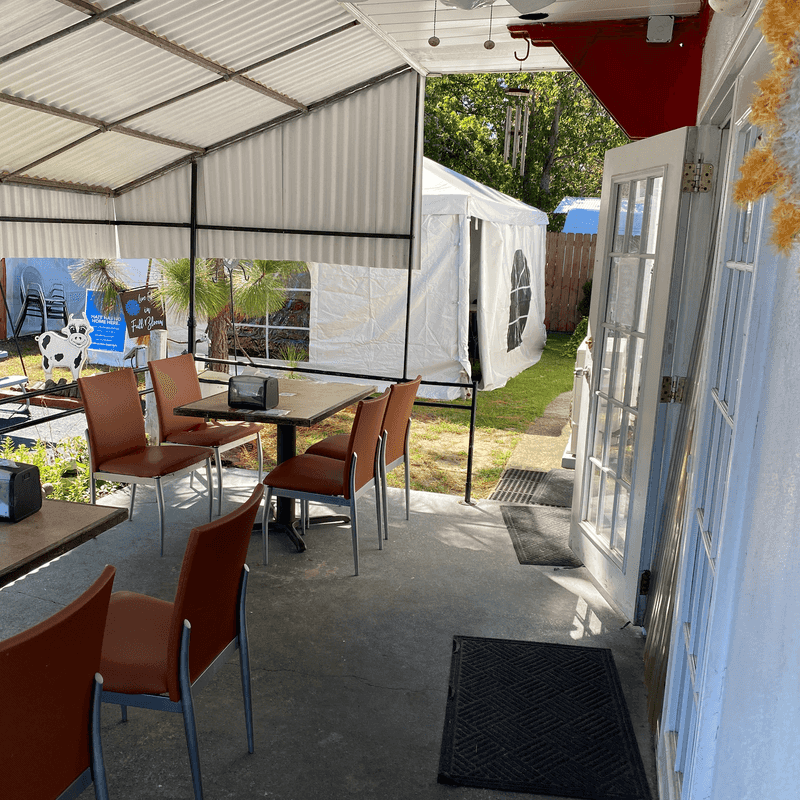 Music, Patio Seats, and a Cozy Dining Room