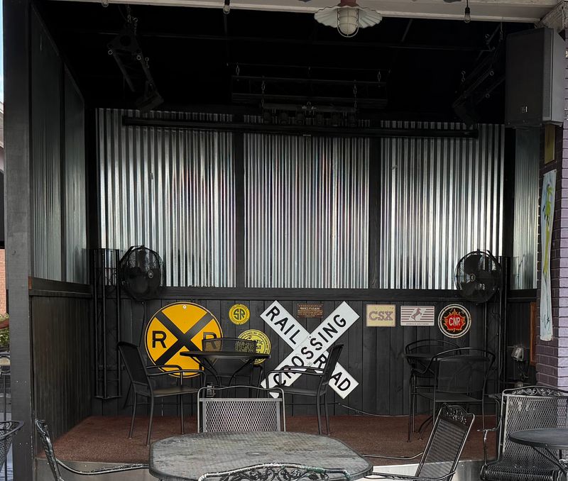 Patio Seats and Passing Trains