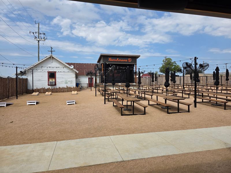 Patio, Stage, and Cornhole