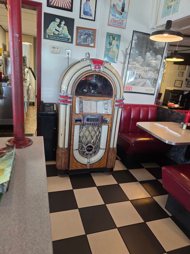 Red Booths, Jukebox Tunes, and Famous Faces