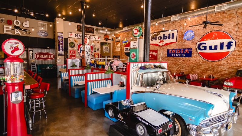 Road Signs, License Plates, and Parked Classics