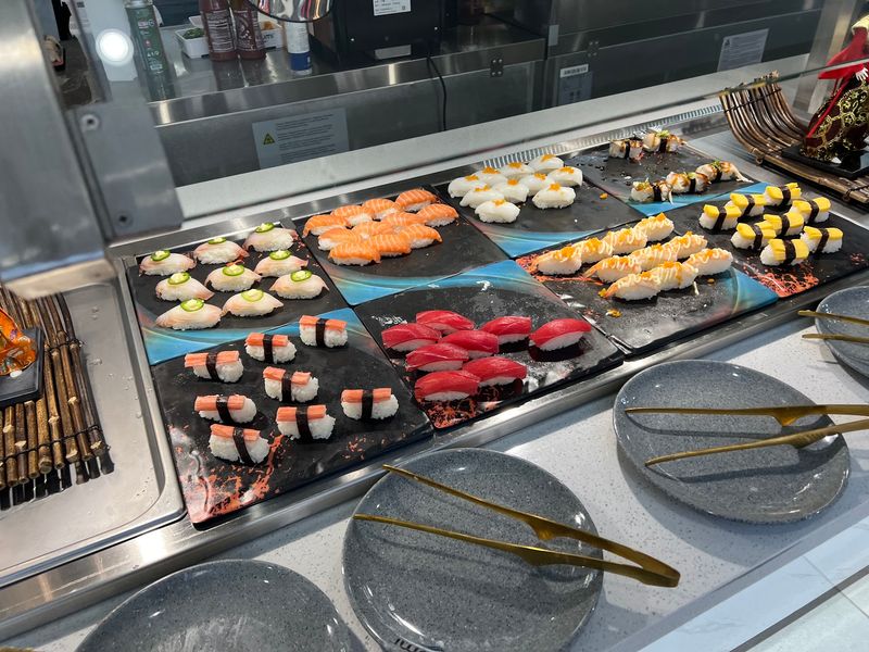 Rolls, Nigiri and a Sashimi Spread Rolls, Nigiri and a Sashimi Spread