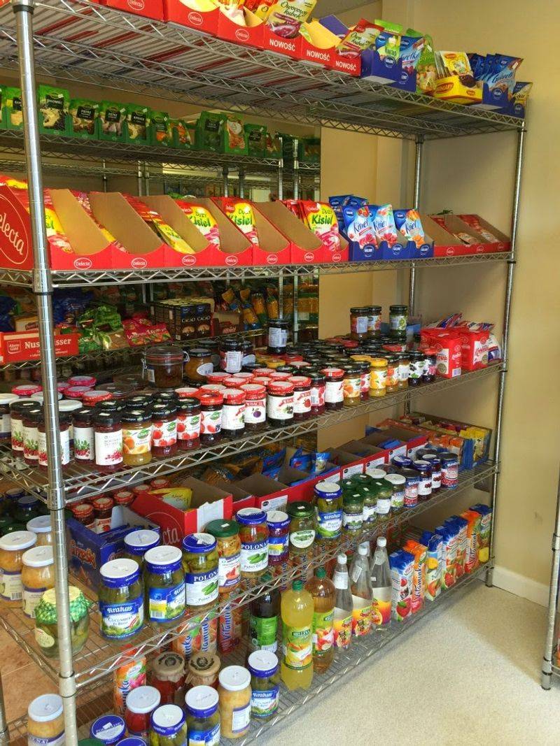 Shelves Stacked With Imported Staples