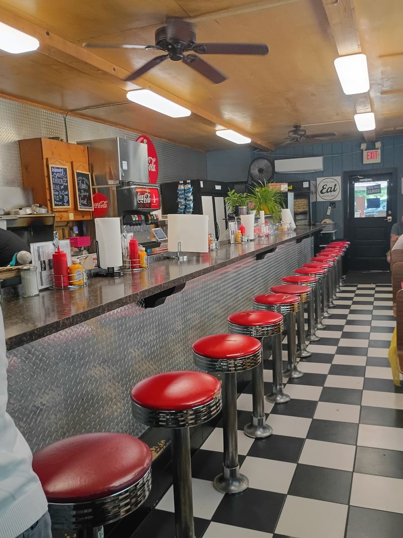 Six Booths and Fourteen Stools Six Booths and Fourteen Stools