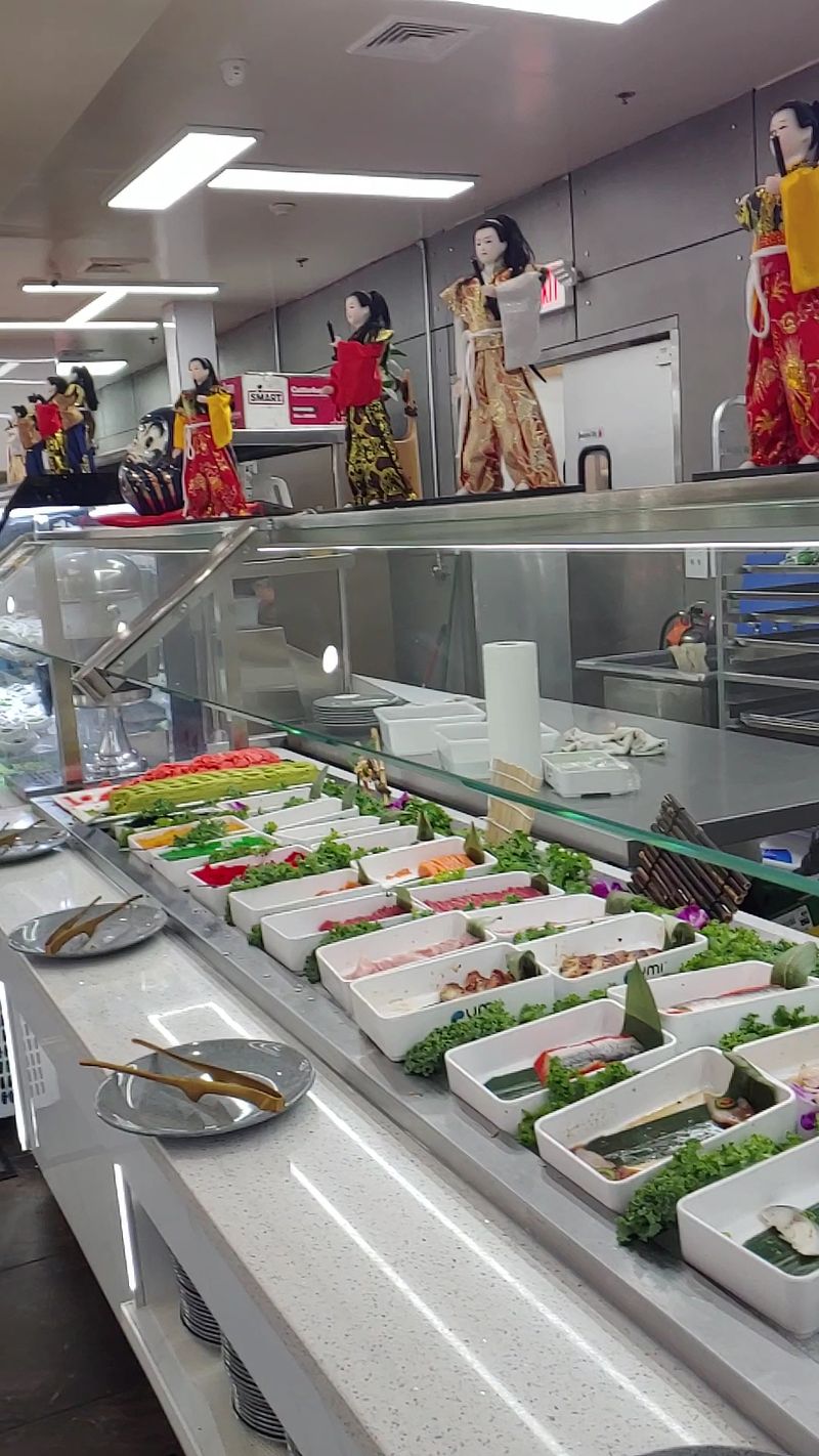Sushi and Sashimi on a Buffet Line Sushi and Sashimi on a Buffet Line