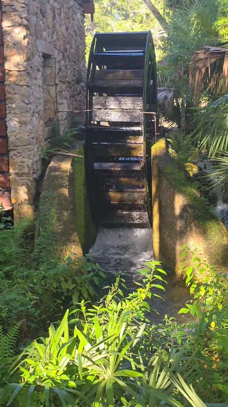The Mill House And Its Turning Wheel