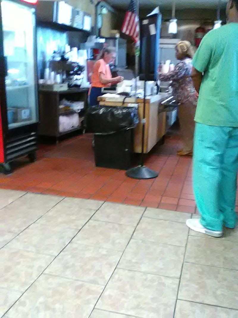 The Owner Behind the Counter The Owner Behind the Counter