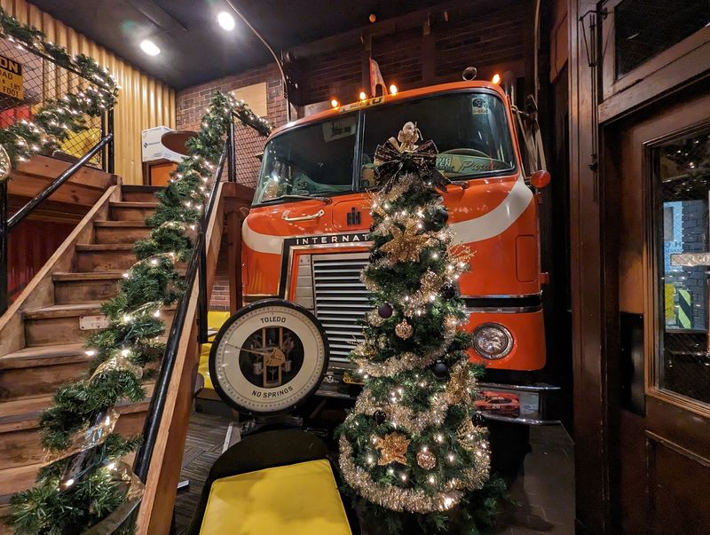 Toys, Trucks, and a Semi Cab Indoors