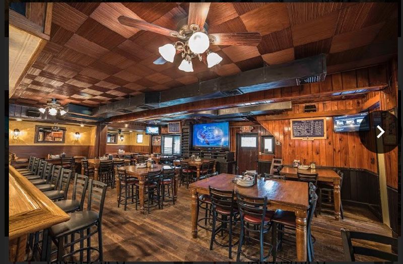 Wood Walls, Big Screens, And A Deck Wood Walls, Big Screens, And A Deck